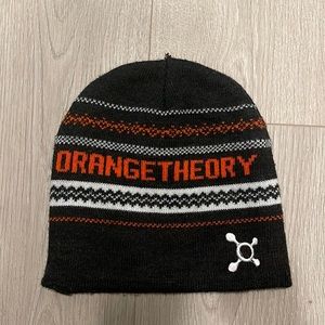 Orange theory fitness beanie and towel.